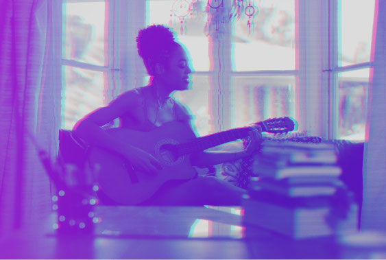 Woman playing guitar